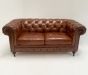 Button back settee