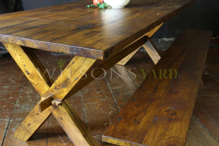 Kitchen / Dining table with axe legs in reclaimed oak