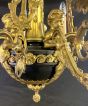 Stylish French gilded brass chandelier, supporting cherubs and 6 candles