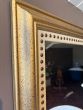 Stylish & studded gilt mirror