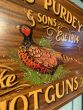 James Purdy shotgun wooden sign