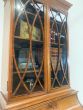 Victorian glazed bookcase in figured inlaid Mahogany