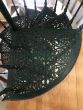 Original Victorian cast iron spiral staircase with intricate fleur de lys detailing