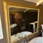 Stylish & studded gilt mirror