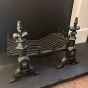 Black cast iron dog grate