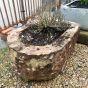 D shaped red sandstone planter trough