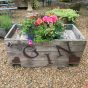 Wooden Gin metal sign garden planter on wheels 