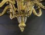 Decorative brass chandelier with cherub detailing